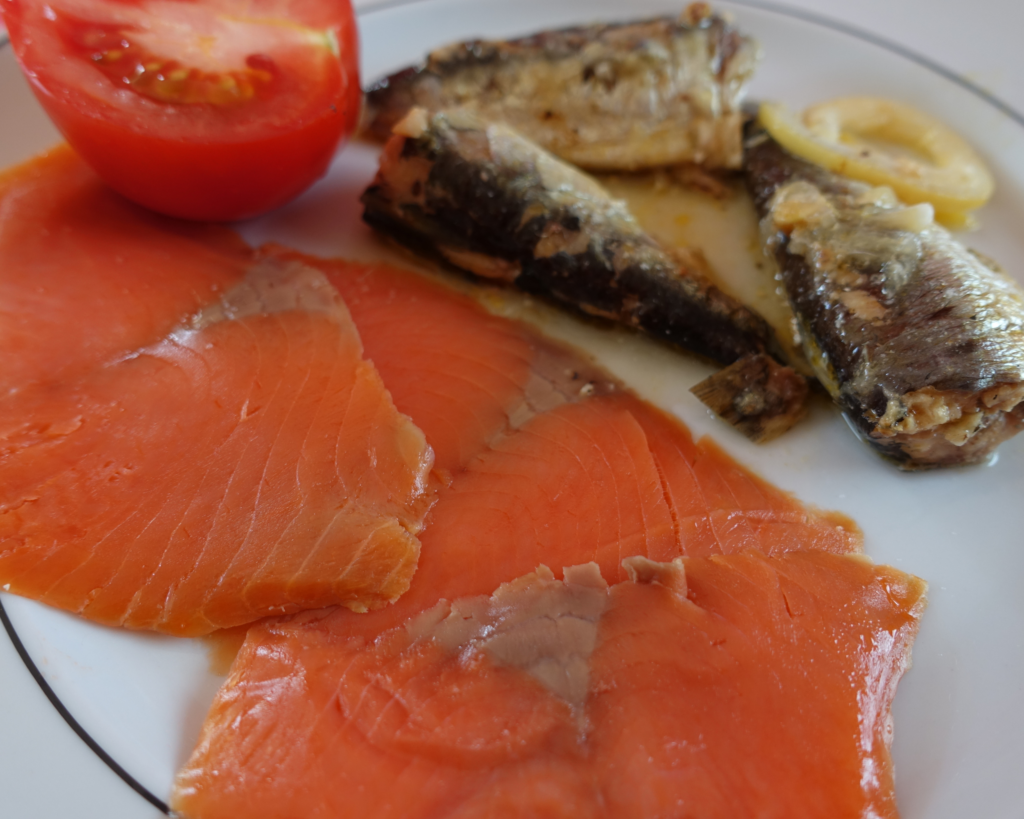 salmon and sardines on a plate