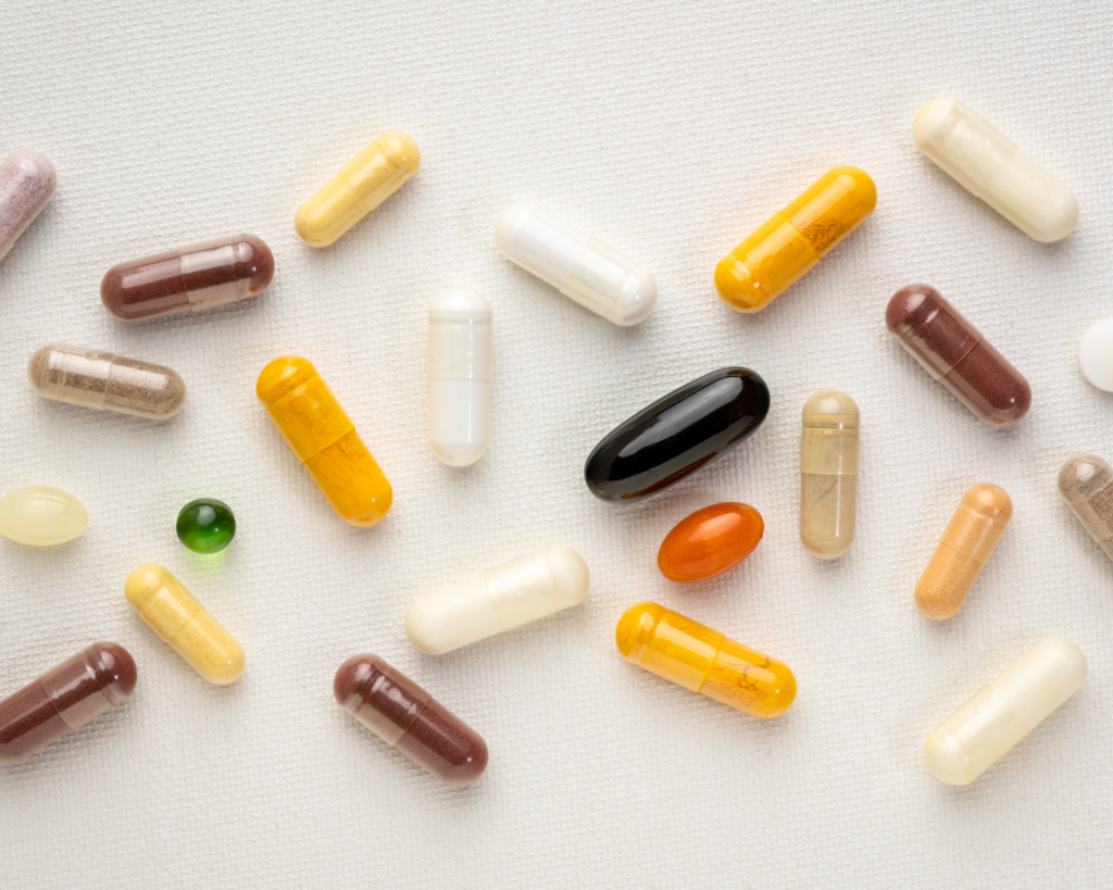 close up of random supplement tablets